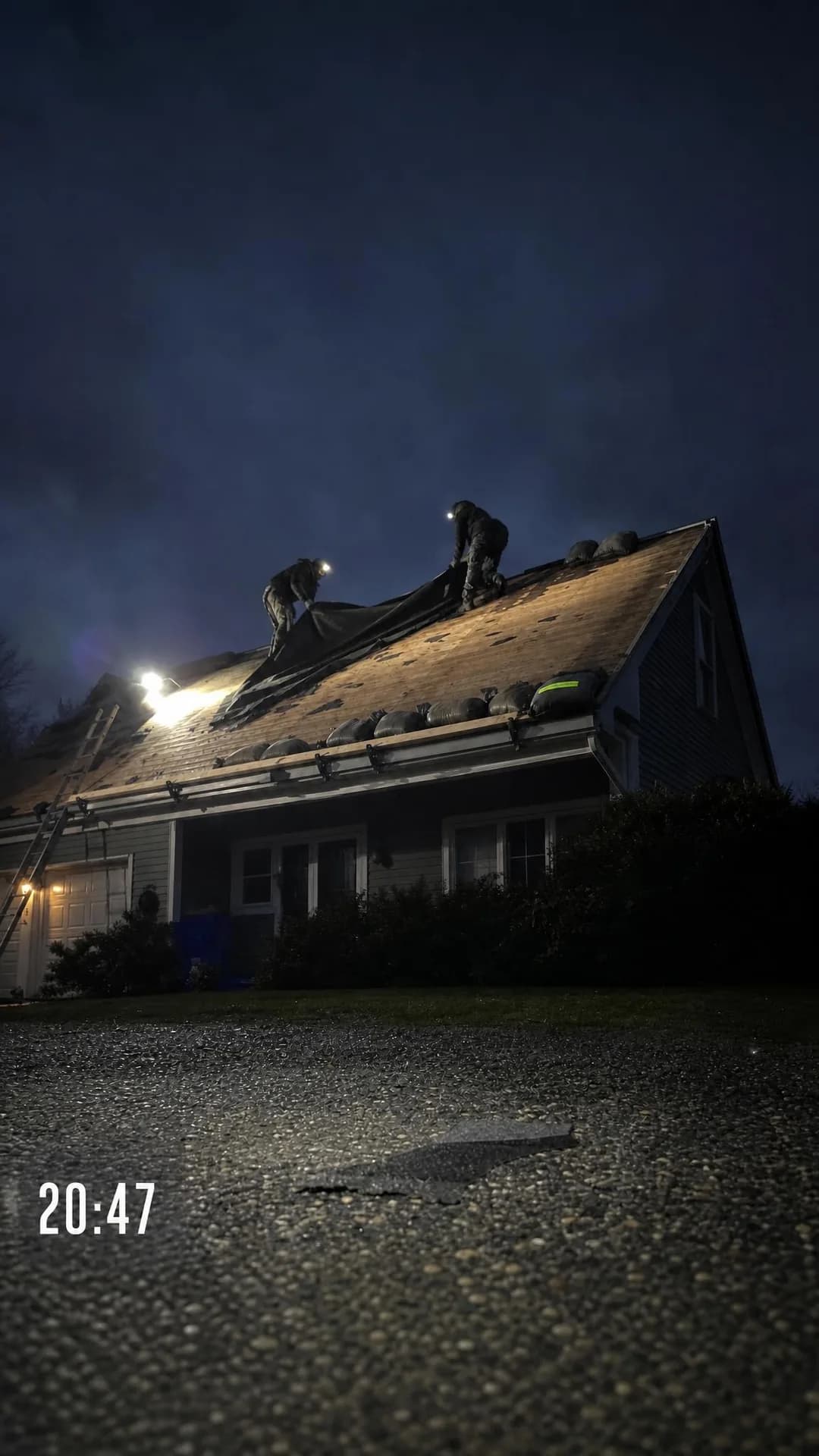 Raw phone pic, portrait 9:16. The median call-to-covered time is 2 hours 40 minutes — faster than most roofers even answer the phone.