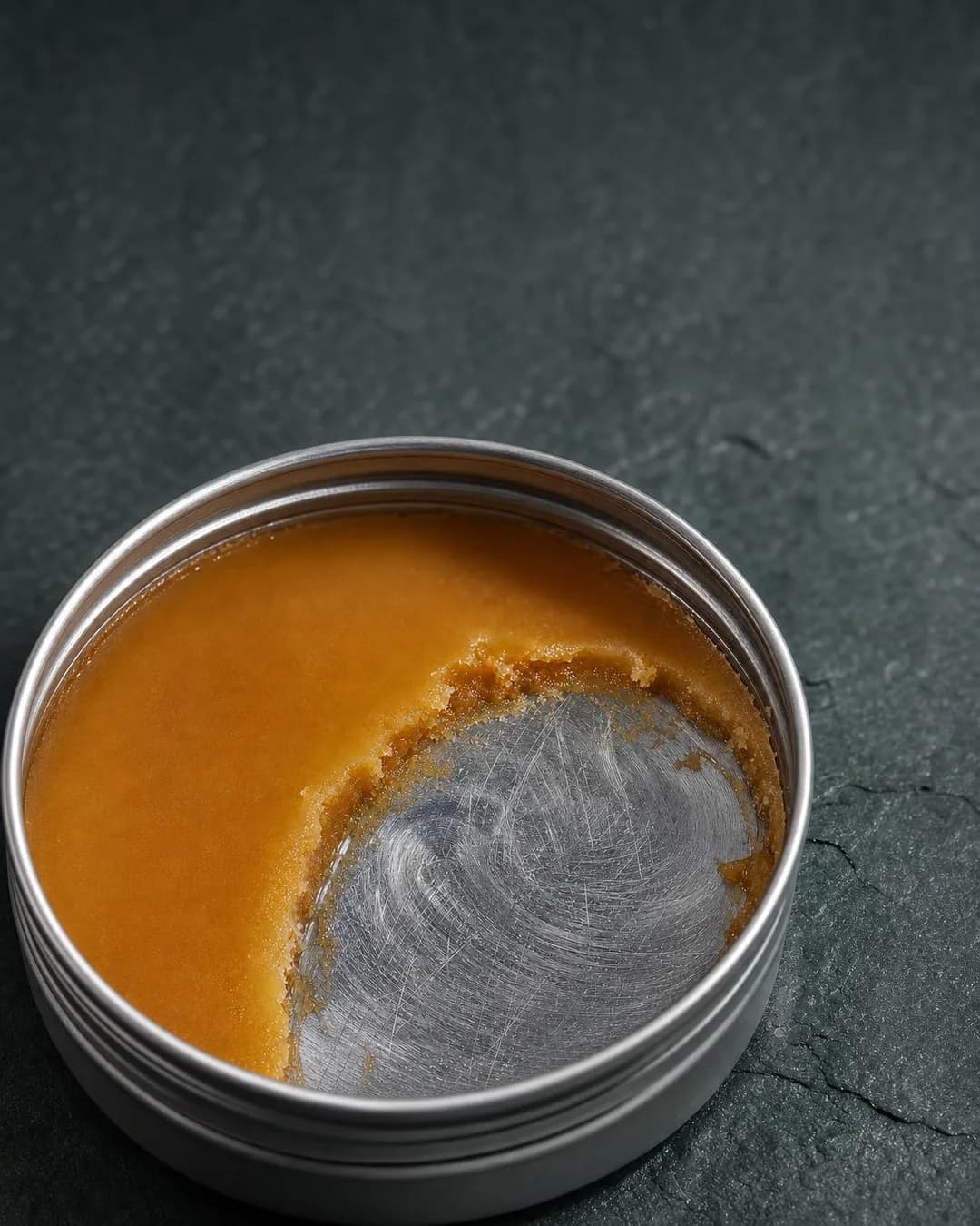 Macro / texture detail, portrait 4:5. We formulate once per autumn, meaning when this single harvest sells out, production ceases until next year.